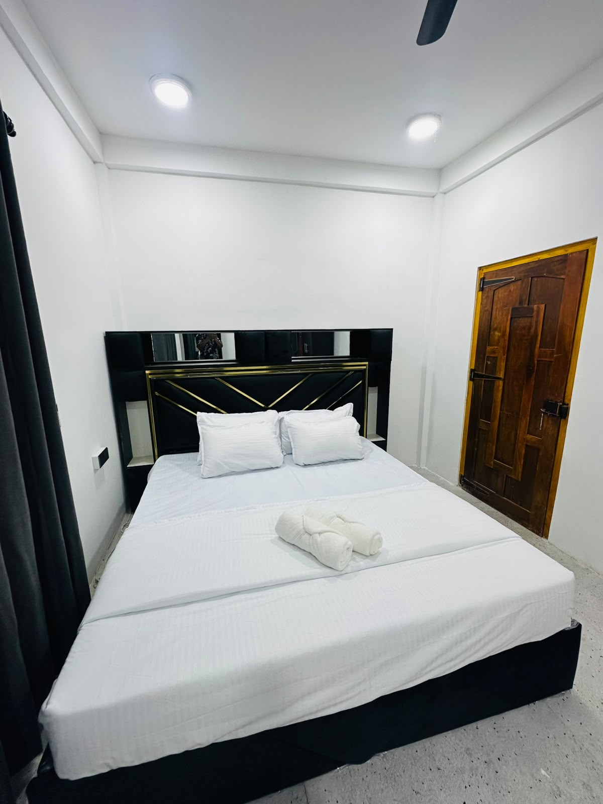 Bedroom perspective highlighting curtains and surrounding floor area