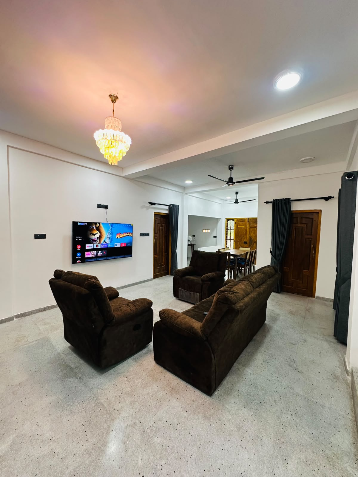 Dining table and lounge flow at Citadine Green
