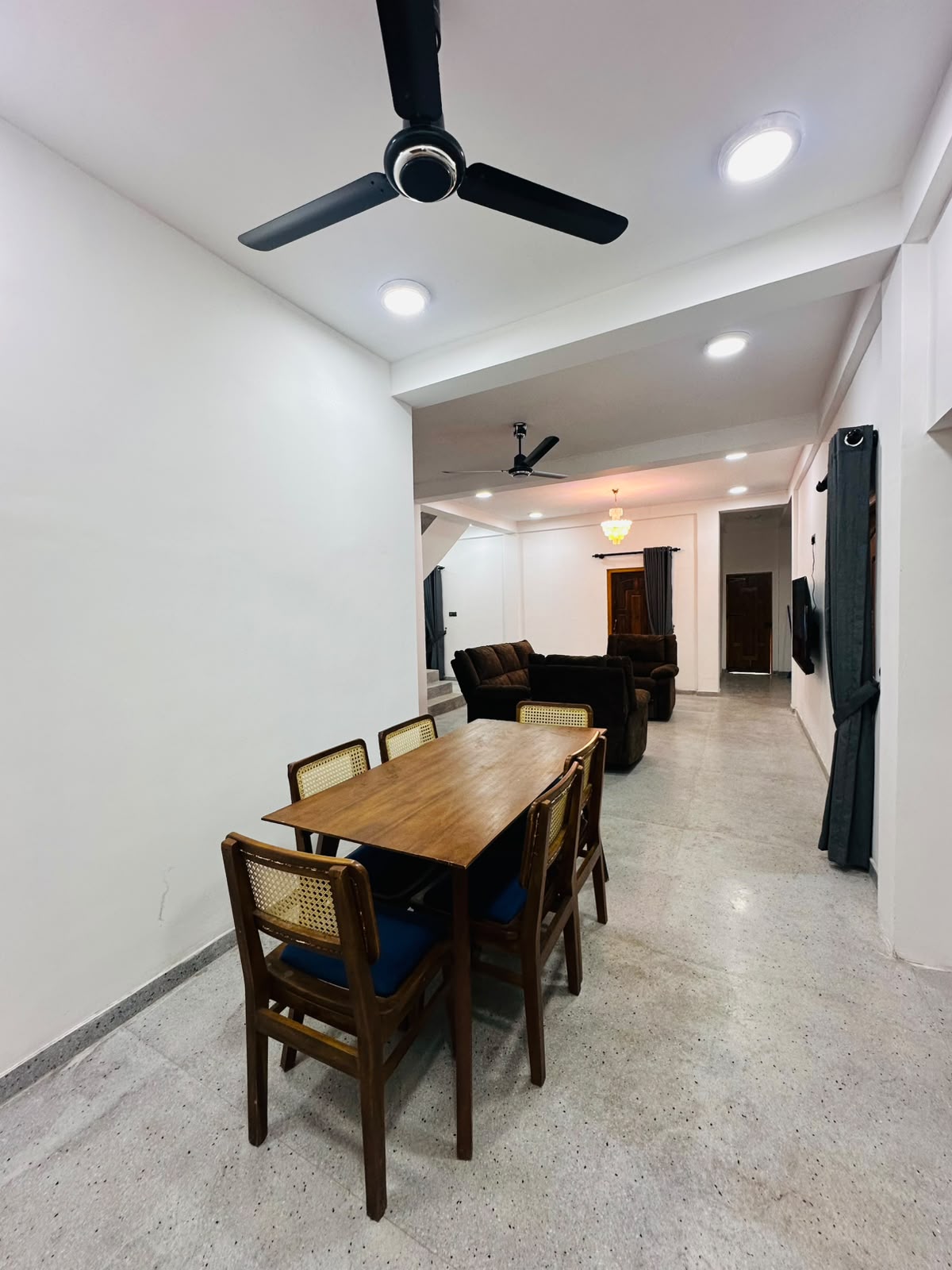 Dining corner leading into the villa's main sitting area